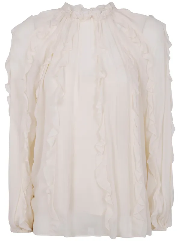 "FRILL" BILLOW BLOUSE sold by Lord & Taylor