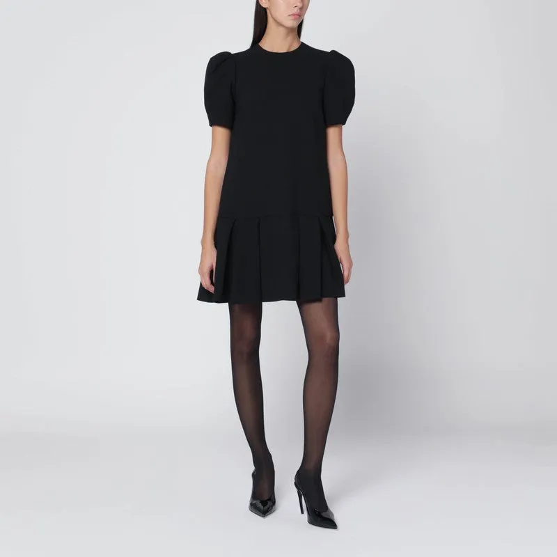 Moschino Black mini dress with pleats sold by Lord & Taylor