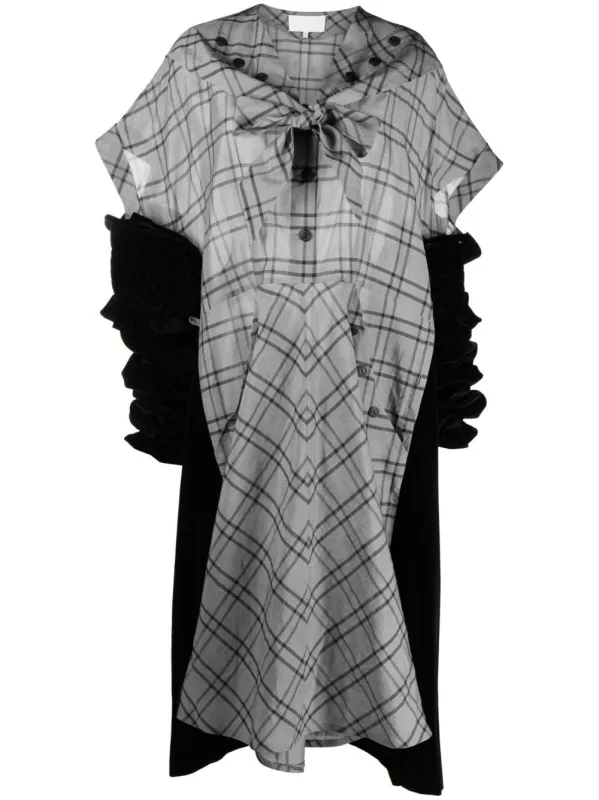 MAISON MARGIELA BLACK AND GRAY BI-MATERIAL DRESS. 
FLARED CUT. 
CHECKED GRAY SILK FRONT AND BACK. 
BLACK VELVET SIDES. 
LONG VELVET SLEEVES WITH TIGHTENED CUFFS. 
V-NECK WITH BUTTONS AND BOW sold by Lord & Taylor