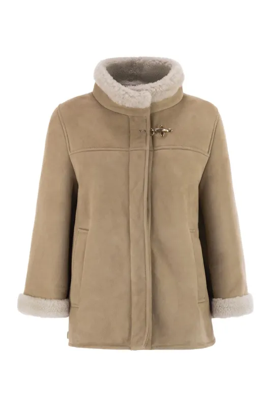 LEATHER SHEALING CAPE sold by Lord & Taylor