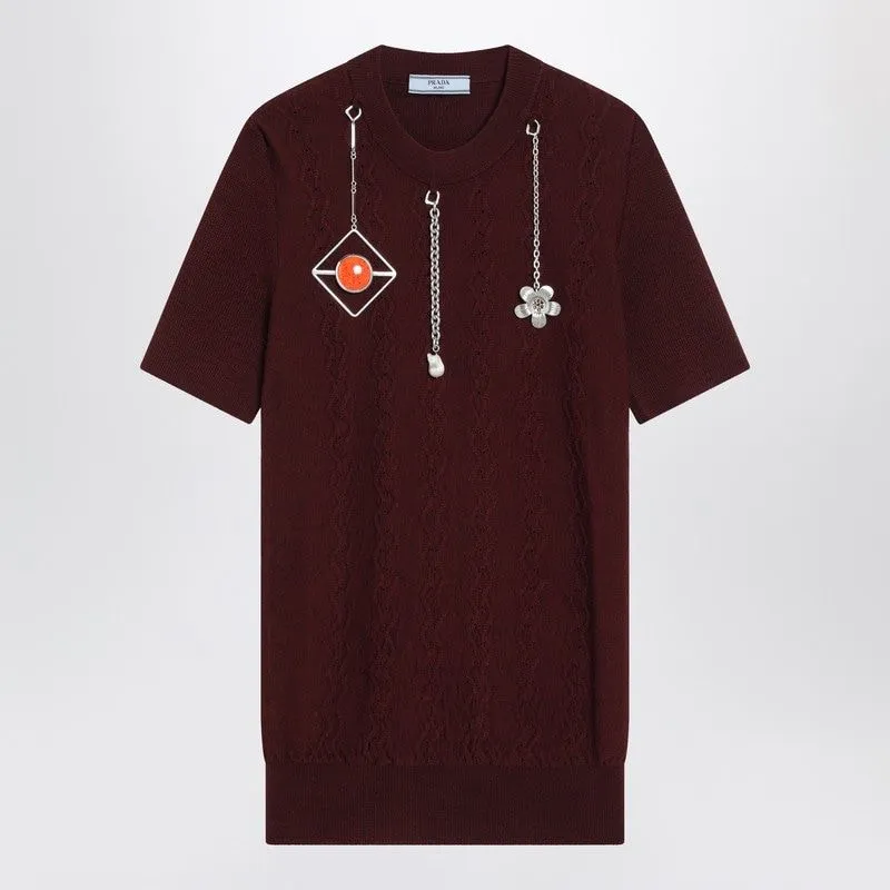 BURGUNDY WOOL SWEATER WITH CHARMS sold by Lord & Taylor