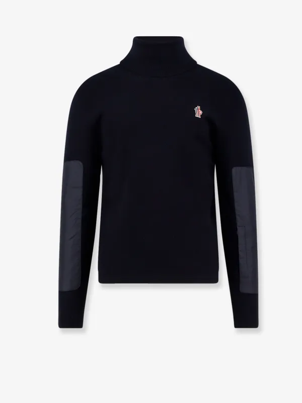 Wool Turtleneck with Inserts sold by Lord & Taylor