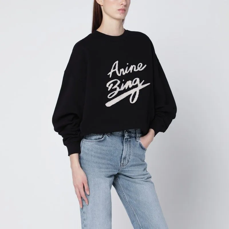 OVERSIZED BLACK SWEATSHIRT WITH CHENILLE LOGO sold by Lord & Taylor