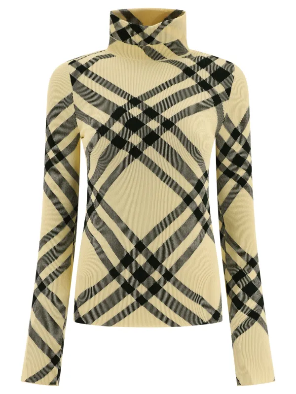 "Check" Turtleneck sweater sold by Lord & Taylor