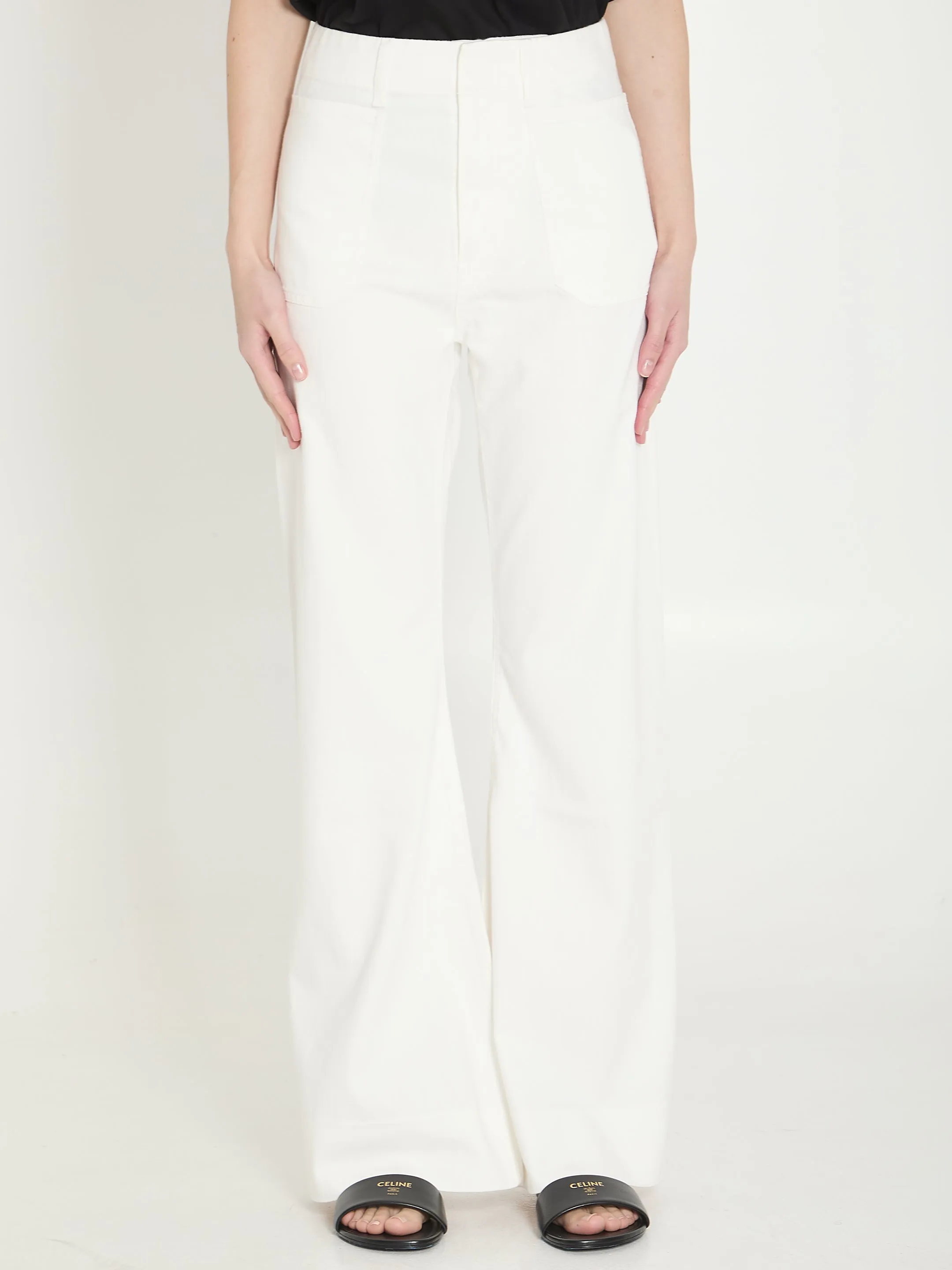 TRIOMPHE FLARED JEANS sold by Lord & Taylor