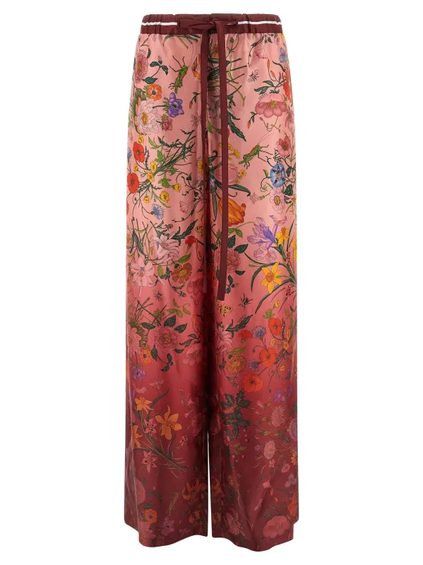 'Flora' print pants made by Gucci