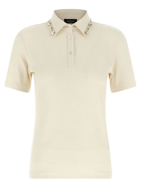 Crystal collar polo shirt sold by Lord & Taylor