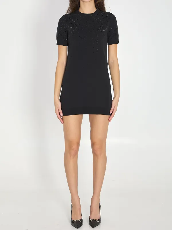 Fine wool dress with GG crystals sold by Lord & Taylor