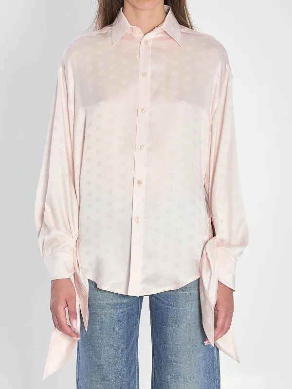 Silk shirt with knotted cuffs made by Balenciaga