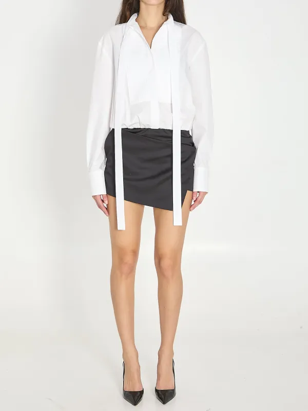 White and black mini dress sold by Lord & Taylor