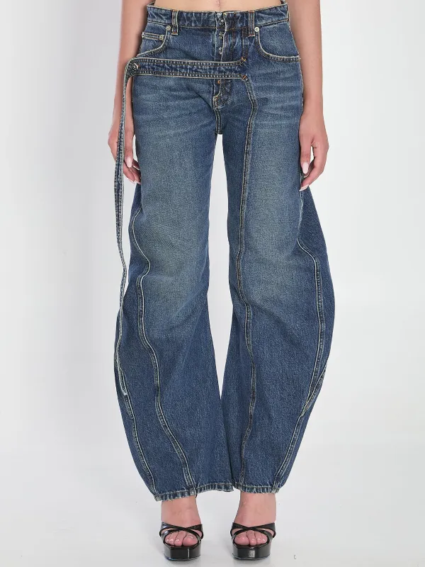 Strap jeans in denim sold by Lord & Taylor