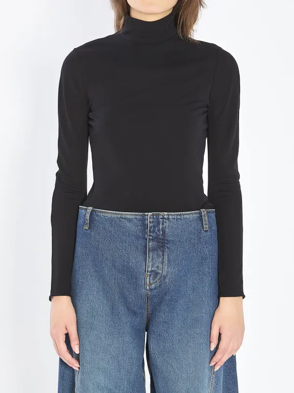 Fluid jersey bodysuit with heart cut-out made by Alaia