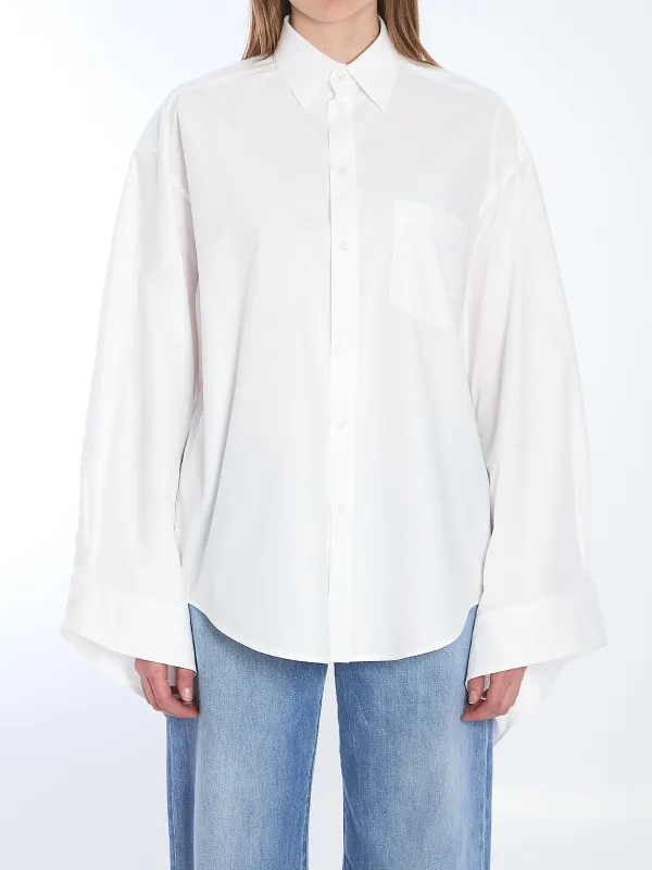 Tied cuffs blouse sold by Lord & Taylor