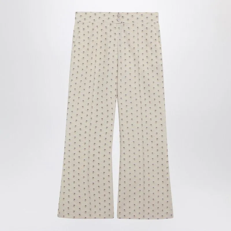 IVORY TROUSERS WITH FLORAL PATTERN made by Valentino