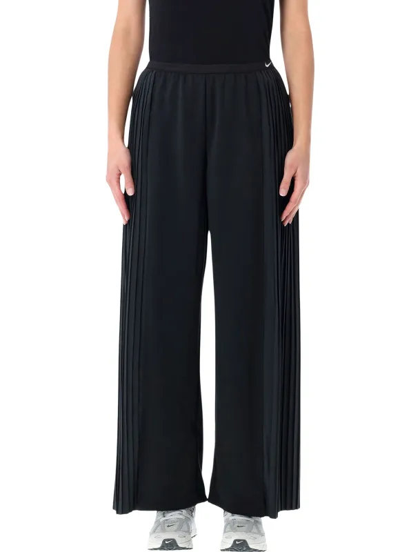 NIKE FLOWING PLEATED WIDE-LEG PANTS made by Nike