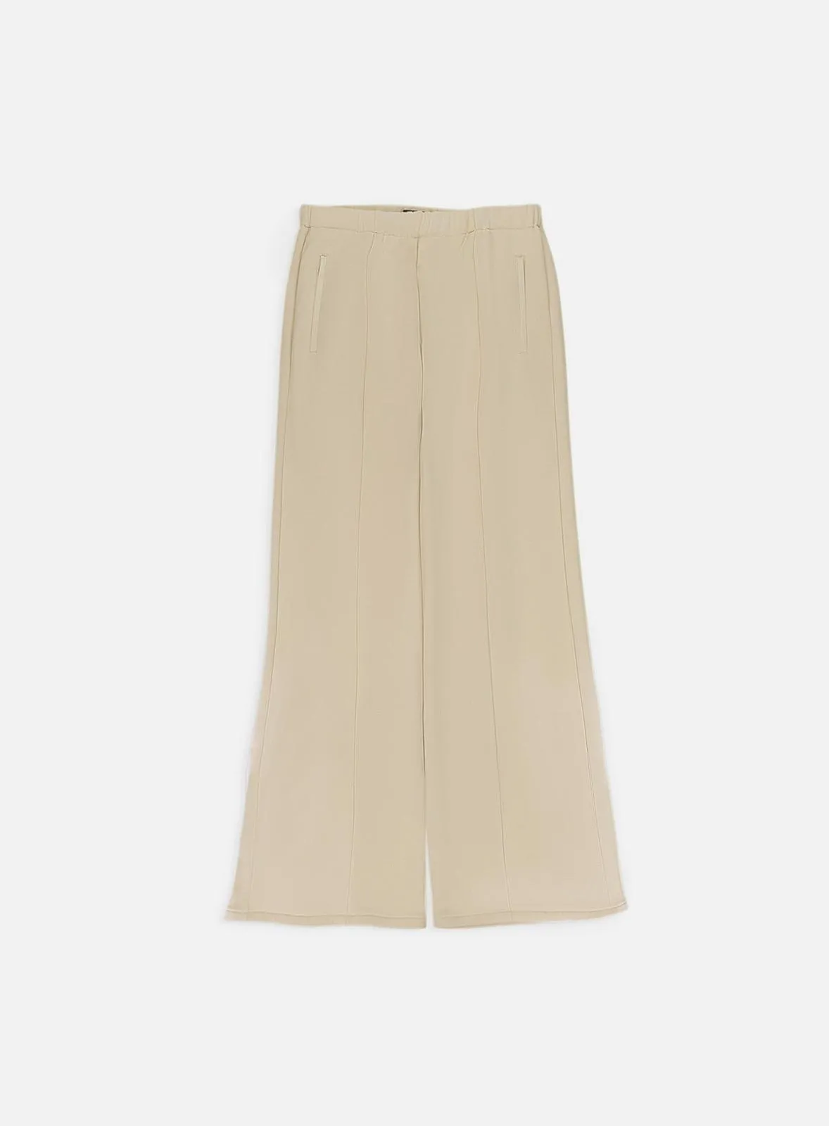 Amiri TAILORED BAGGY PANTS- Alabaster sold by Lord & Taylor