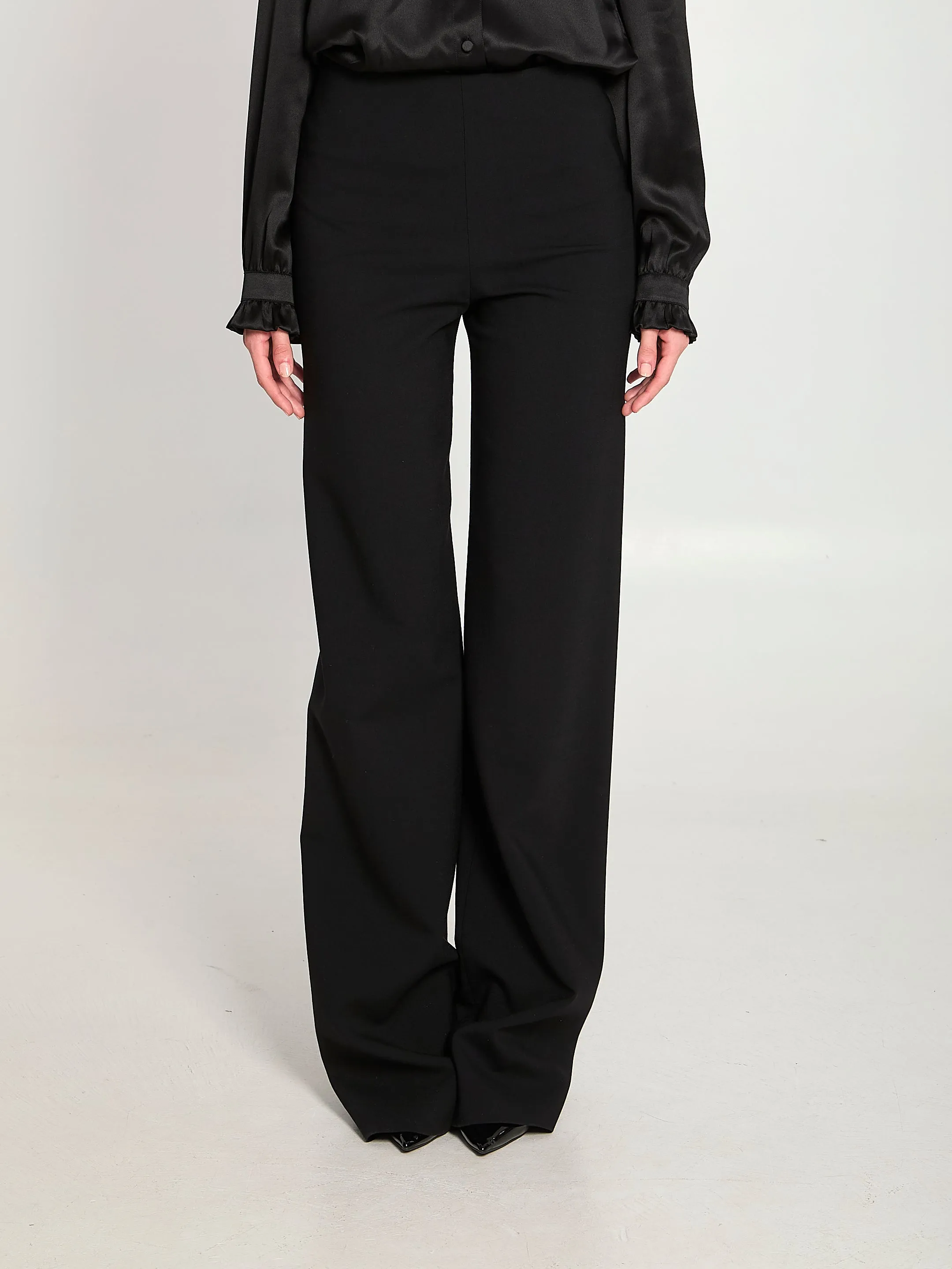 Technical stretch wool trousers sold by Lord & Taylor