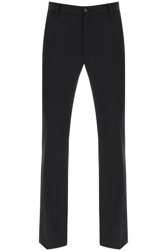 FLARED WOOL TROUSERS made by Dolce & Gabanna