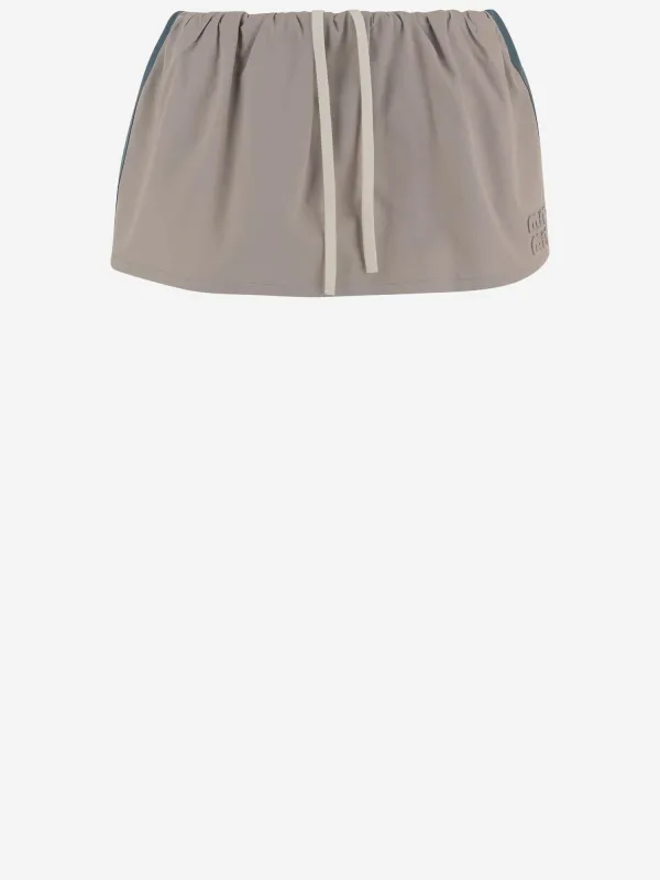 Short Cotton Skirt with Logo made by Miu Miu