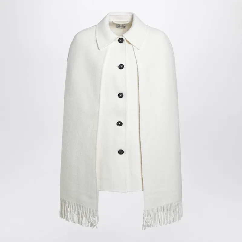 WHITE CAPE JACKET WITH FRINGES made by Toteme
