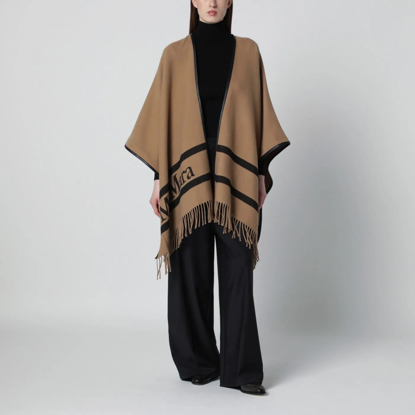 CAMEL JACQUARD WOOL PONCHO sold by Lord & Taylor