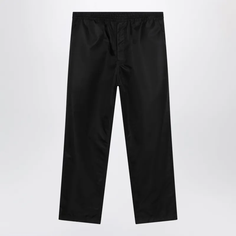 TROUSERS IN BLACK RENYLON made by Prada