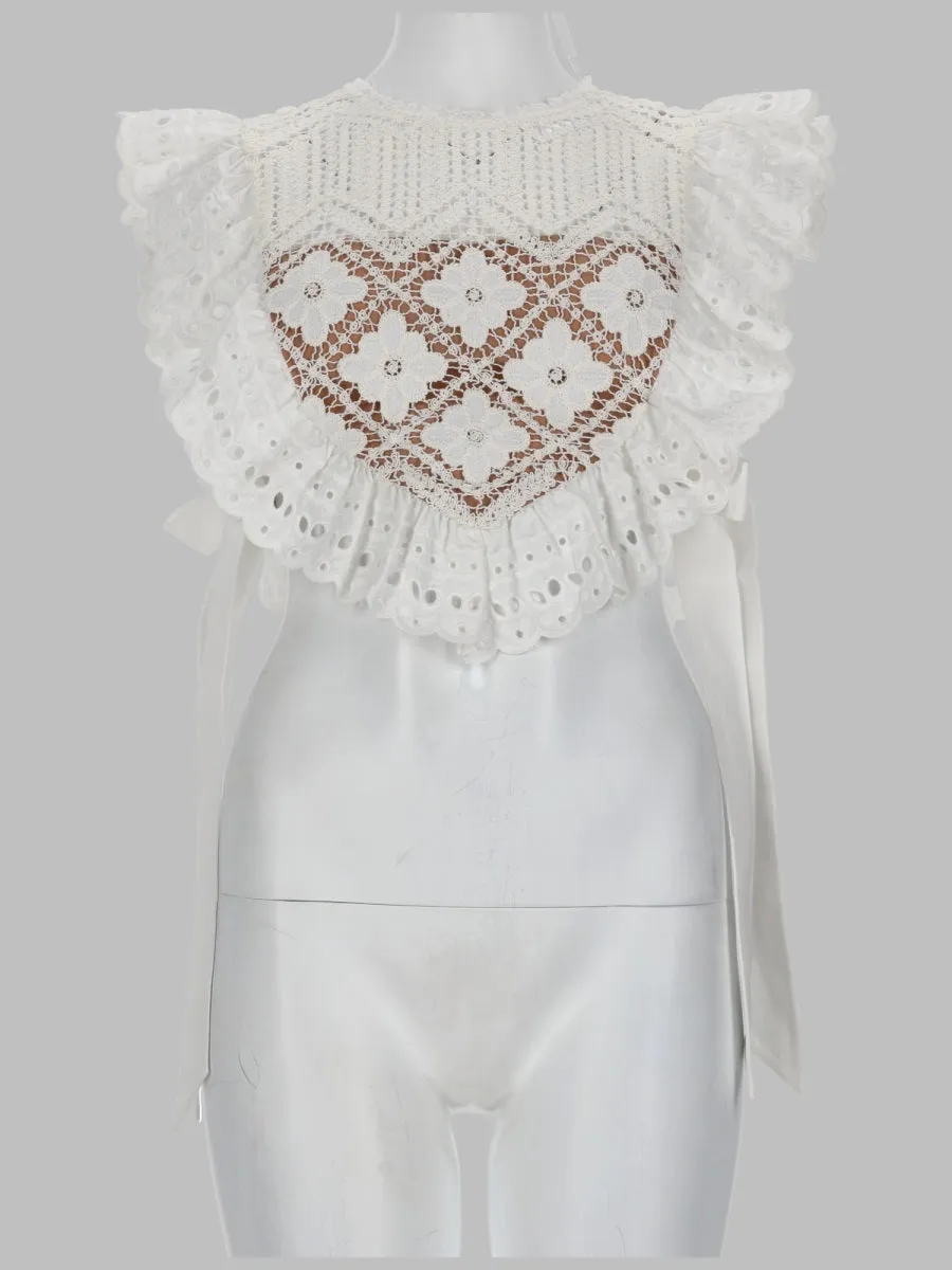 Crop Top in Crochet with Lace Inserts sold by Lord & Taylor