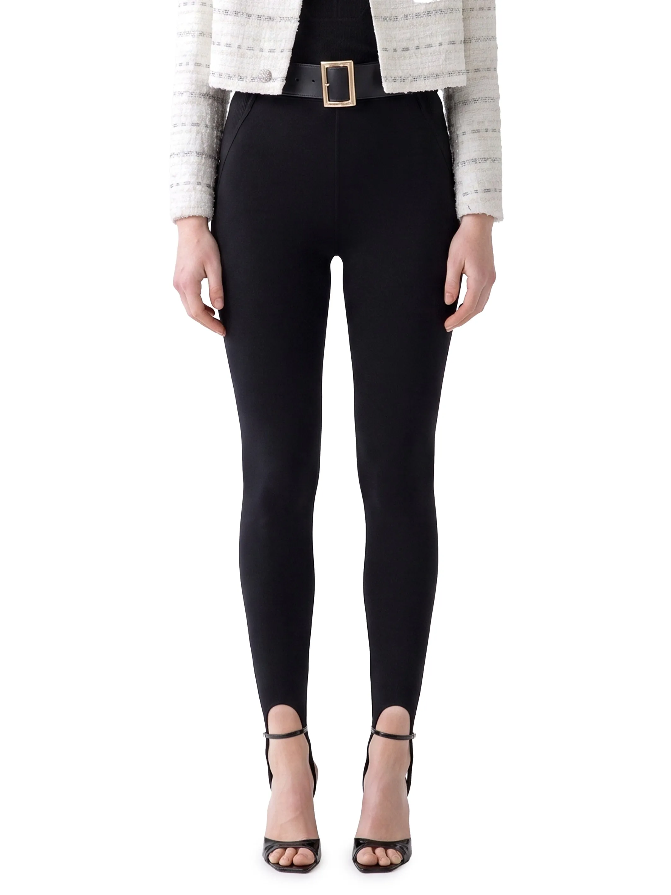 Black knit stirrup leggins sold by Lord & Taylor
