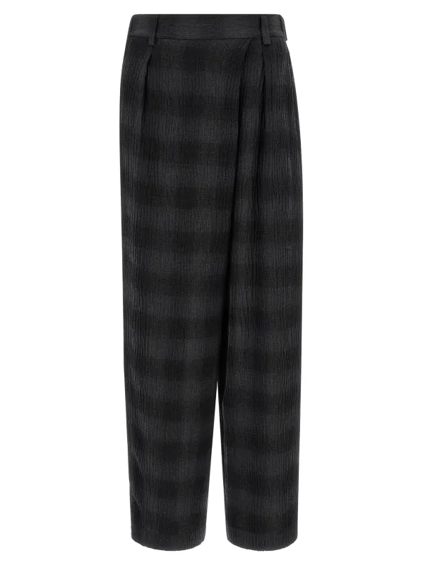Check pants made by Tela