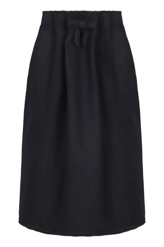 SURE! THE TRANSLATION OF "GONNA MIDI IN LANA CHEVRON" FROM ITALIAN (IT) TO ENGLISH (EN) IS: "CHEVRON WOOL MIDI SKIRT". made by Prada
