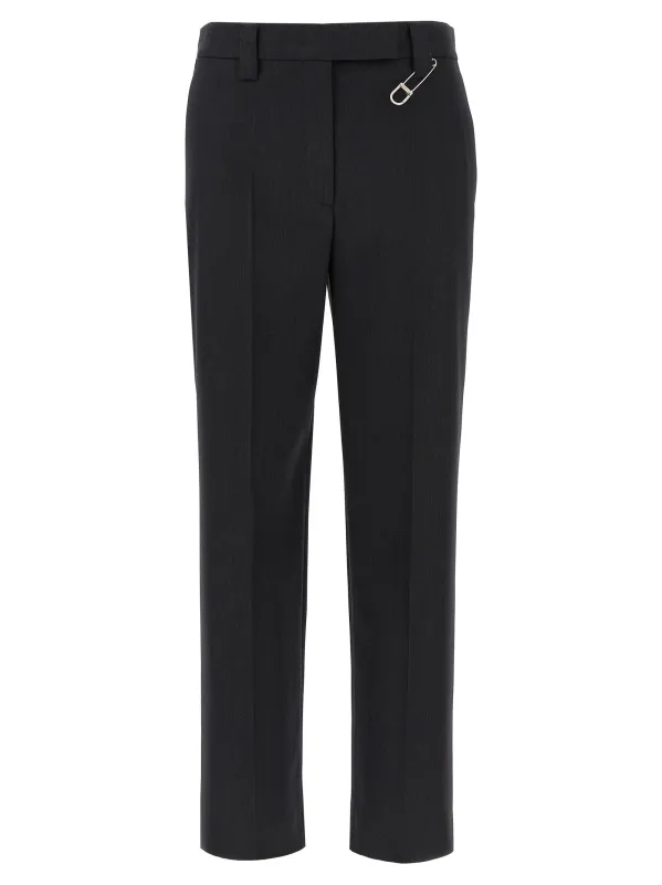 Brooch pants made by Prada