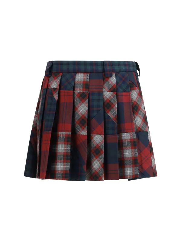 PLEATED PATCHWORK TARTAN MINI SKIRT made by Miu Miu