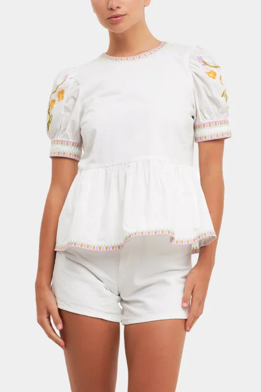 Embroidered Peplum Top sold by Lord & Taylor