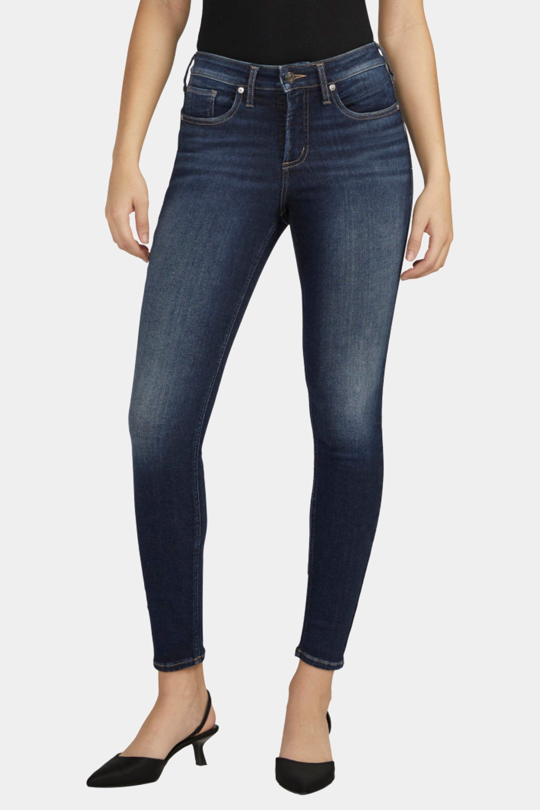 Infinite Fit Mid Rise Skinny Jeans sold by Lord & Taylor