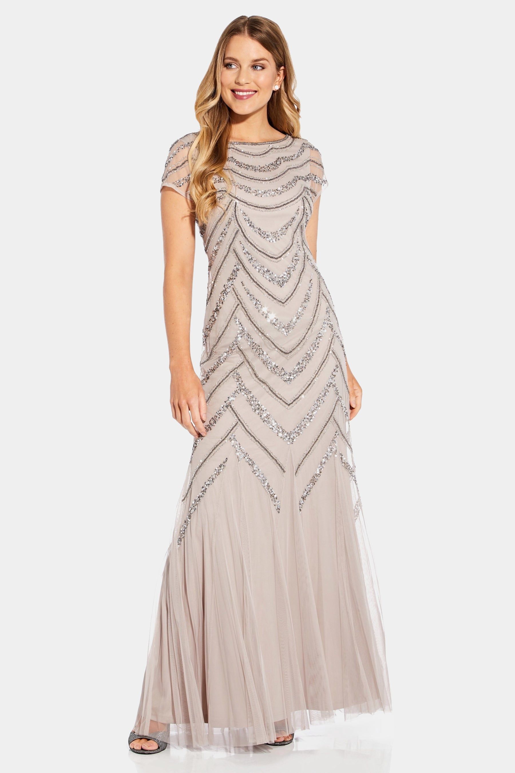 Bead Covered Gown sold by Lord & Taylor