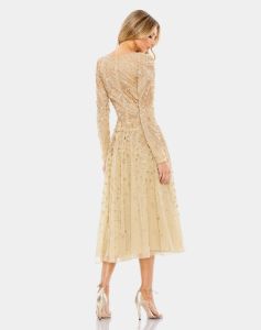 Embellished Illusion High Neck Long Sleeve Dress sold by Lord & Taylor