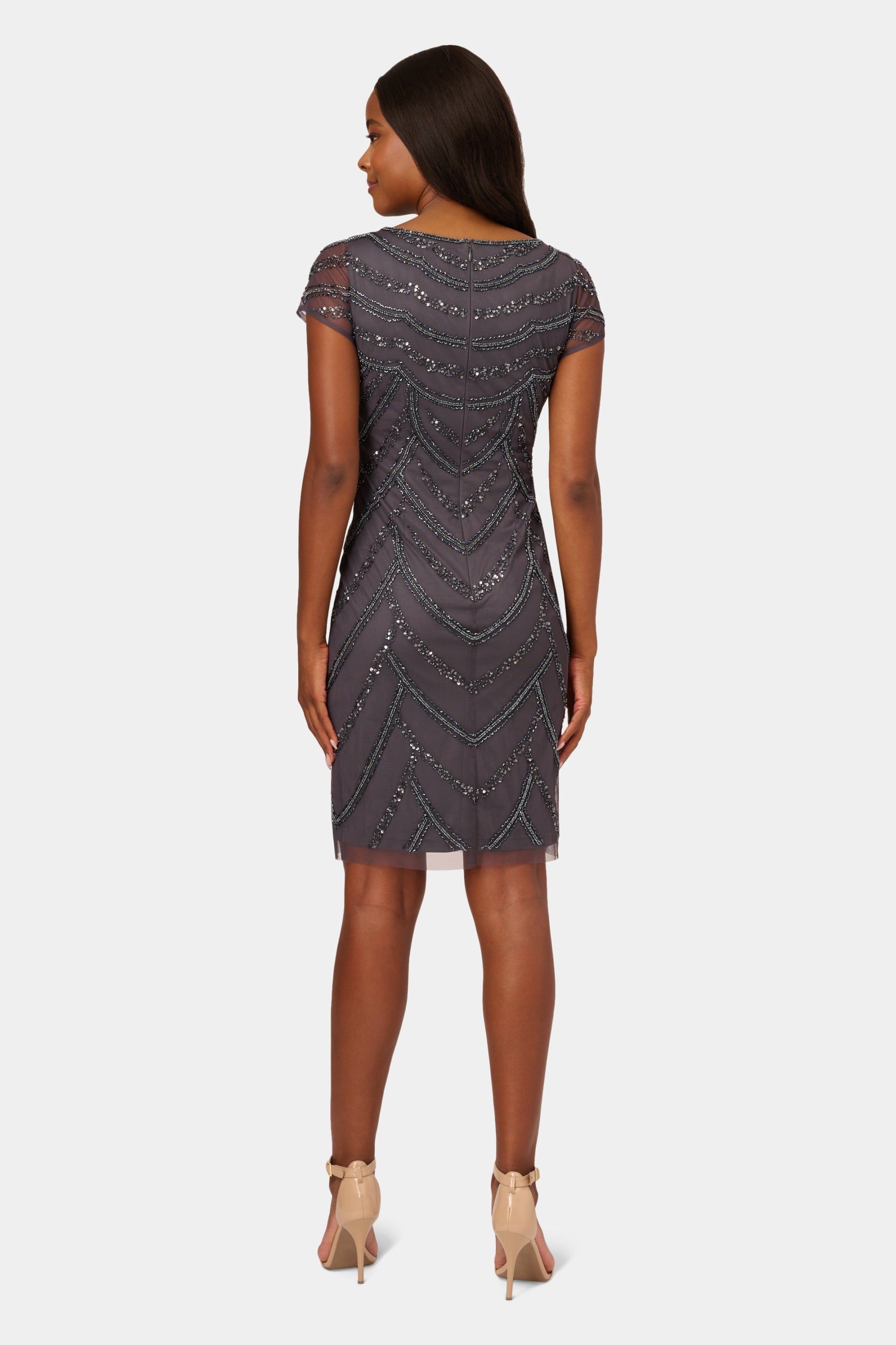 Sheer Cap Sleeve Beaded Cocktail Dress sold by Lord & Taylor