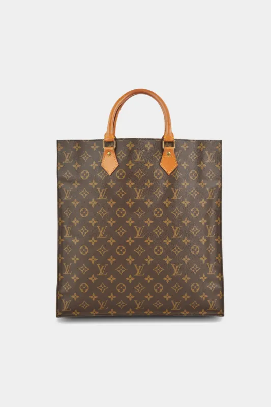 Monogram Sac Plat Handbag sold by Lord & Taylor