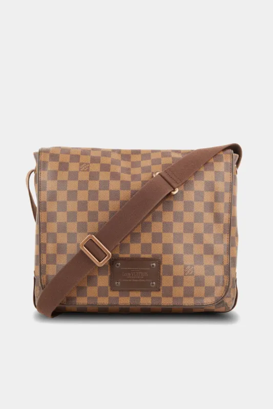 Damier Ebene Brooklyn Messenger Bag sold by Lord & Taylor