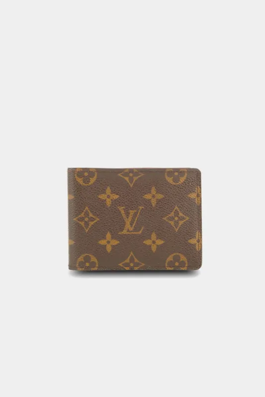 Bifold Monogram Wallet sold by Lord & Taylor