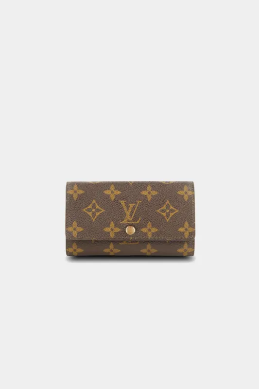 Snap Monogram Wallet sold by Lord & Taylor