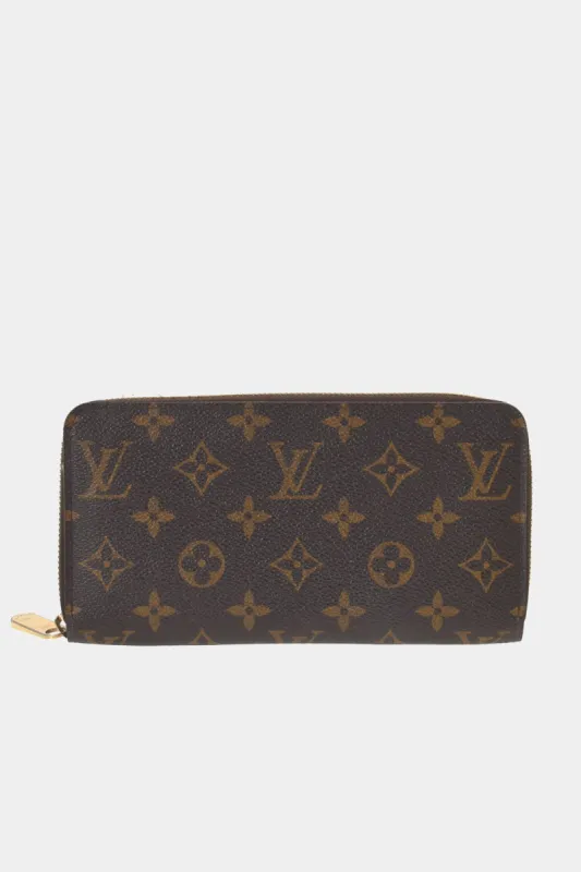 Coated Canvas Zippy Wallet sold by Lord & Taylor