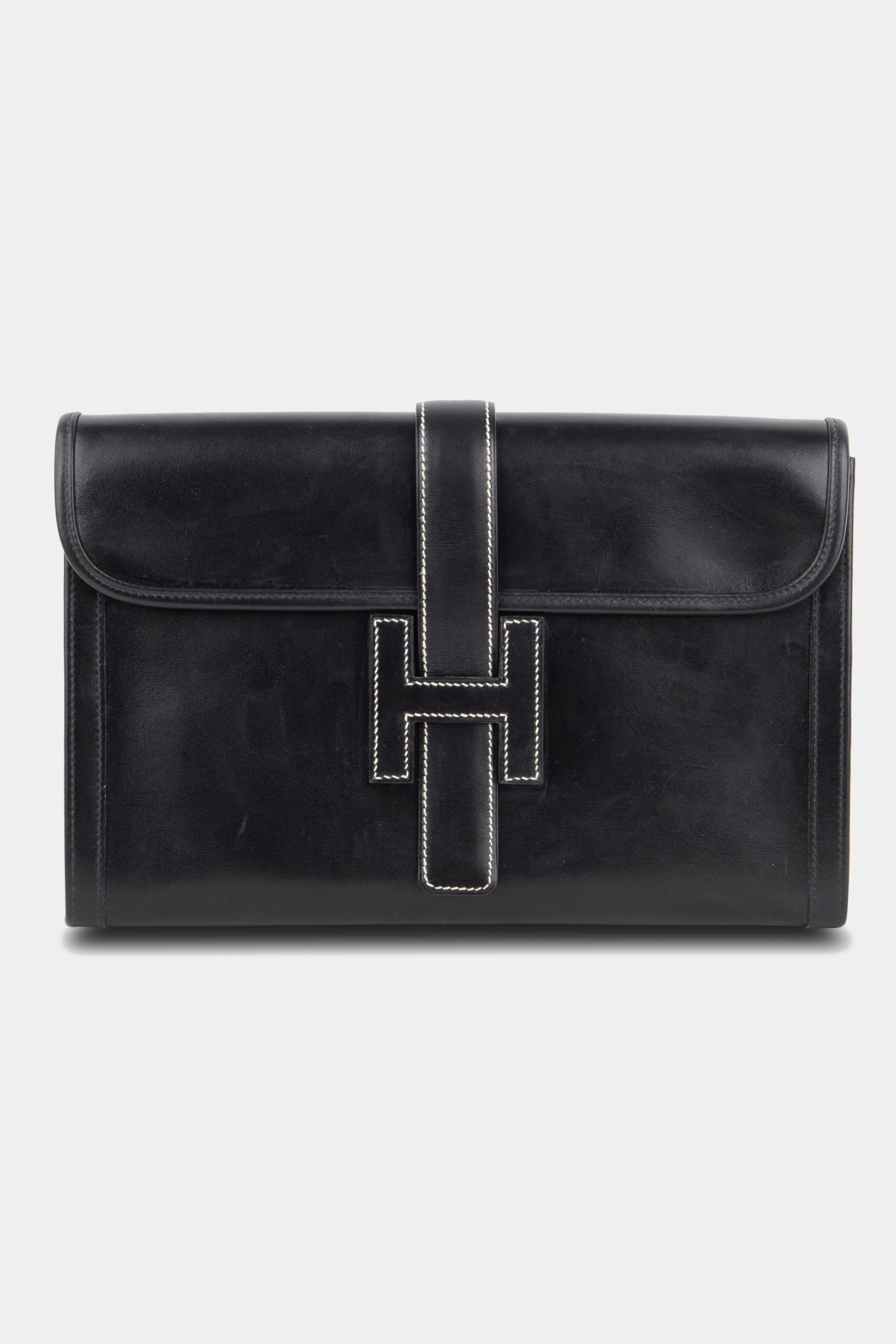 Jige Box Calf Clutch sold by Lord & Taylor