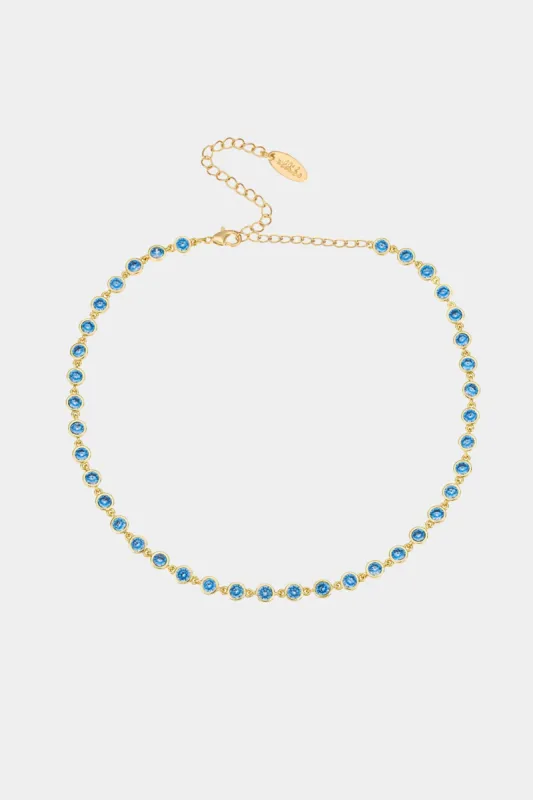 Aqua Crystal Disc and Link Necklace sold by Lord & Taylor