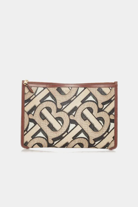 TB Leather Clutch sold by Lord & Taylor