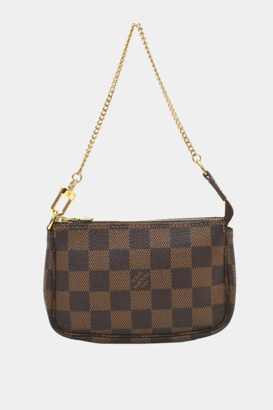 Mini Pochette Accessoires sold by Lord & Taylor