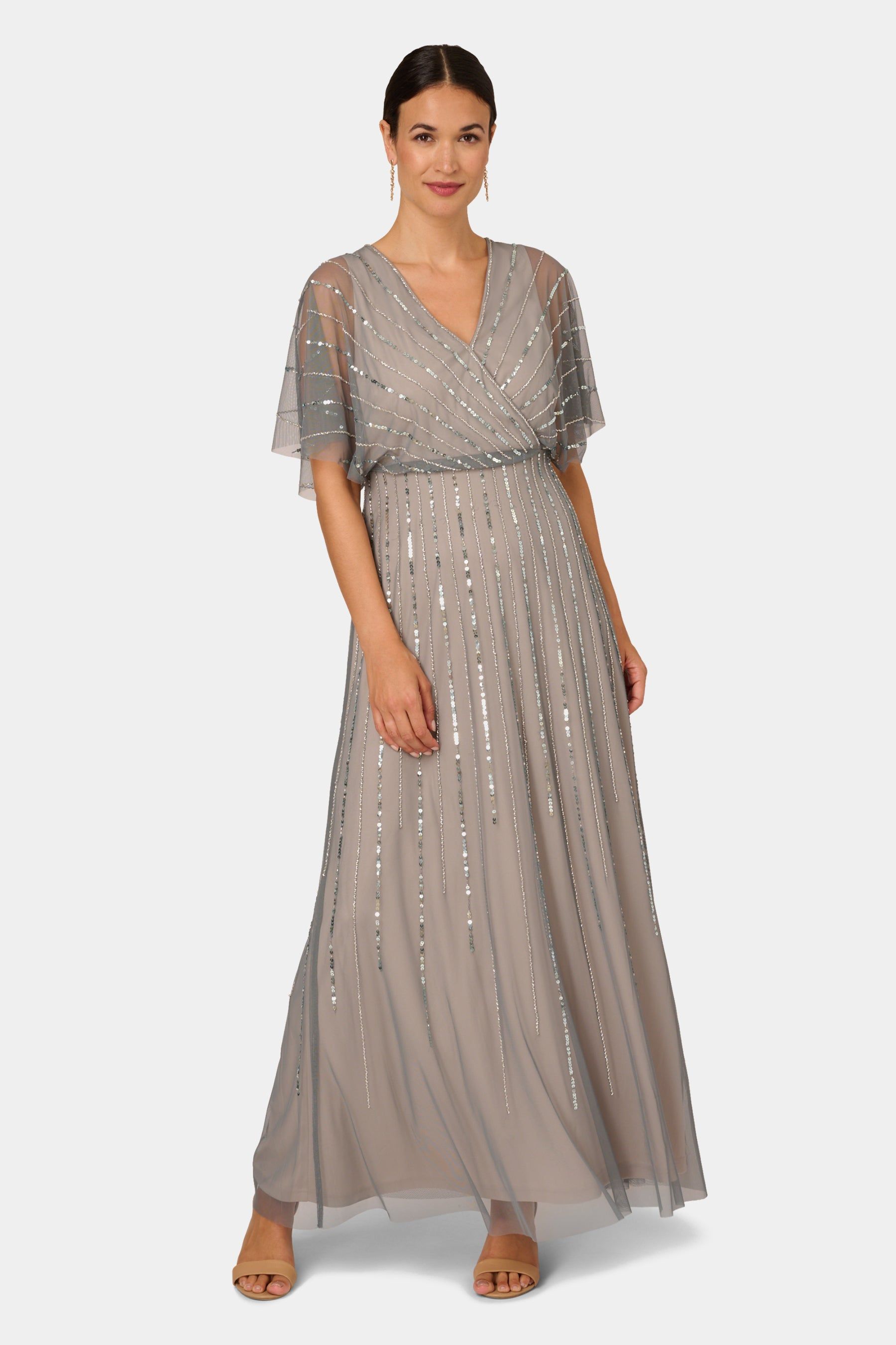 Flutter Sleeve Surplice Blouson Beaded Gown sold by Lord & Taylor