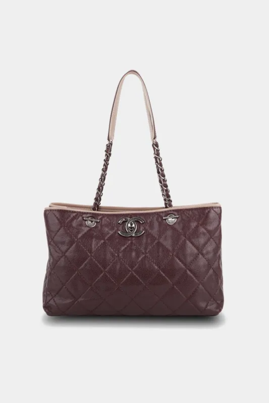 Quilted Caviar Turn lock Tote Bag sold by Lord & Taylor