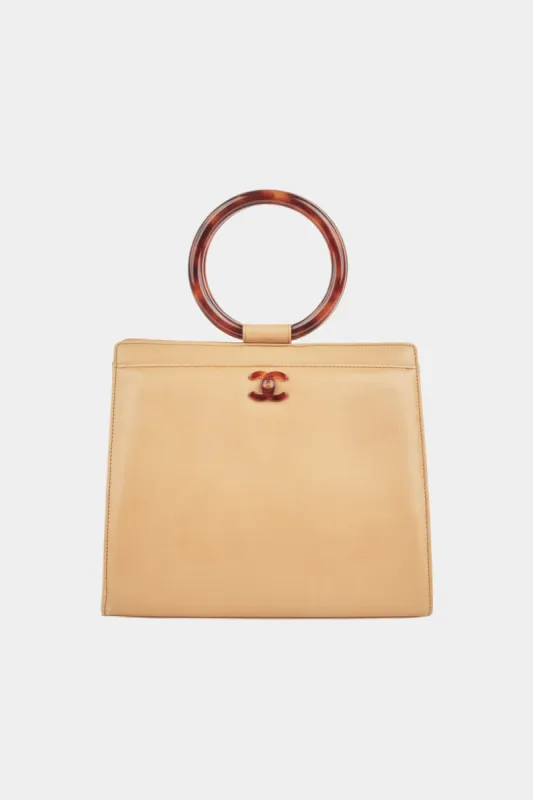 Circle Handle Tote Bag sold by Lord & Taylor