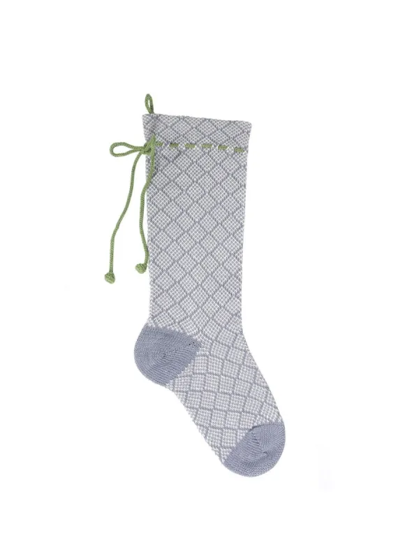 Patterned Stocking with Bow sold by Lord & Taylor